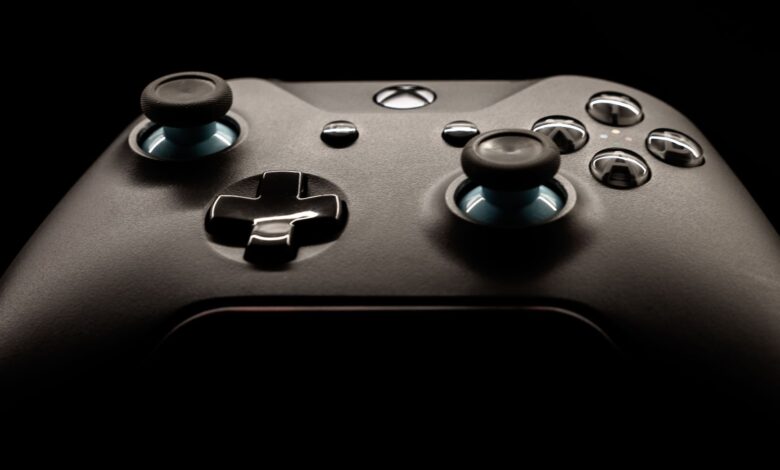 A detailed close-up of a modern gaming controller highlighting its design and functionality.