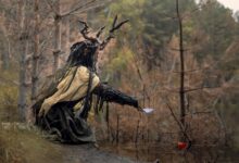 An enigmatic figure with antler headdress sits in a mystical forest clearing.