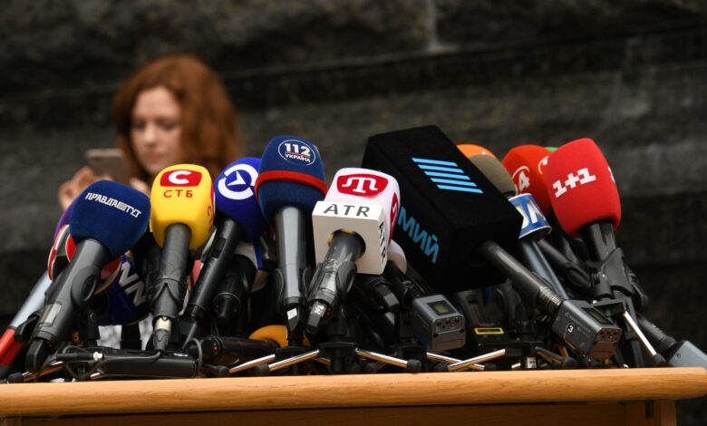 Various microphones setup at a press conference in Kyiv, Ukraine.