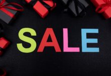 Vibrant SALE text surrounded by gift boxes offers perfect promotional imagery.