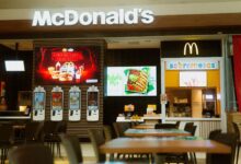 McDonald's fast food restaurant featuring self-service kiosks and digital menus.