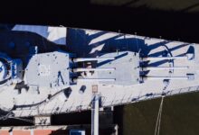 Stunning aerial view of a battleship docked in Philadelphia, showcasing naval architecture.