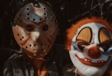 Children wearing horror masks in a dimly lit cornfield, capturing Halloween spirit.