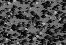 Abstract geometric pattern with monochrome isometric shapes creating a modern and artistic design.