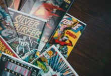 From above of huge collection of various retro comic books with colorful covers placed on floor