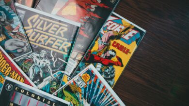 From above of huge collection of various retro comic books with colorful covers placed on floor