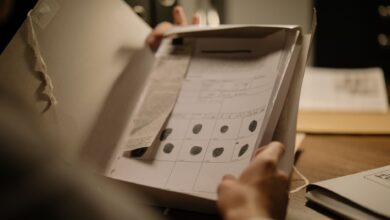 Detailed image showcasing a fingerprint document in an open folder, ideal for forensic and legal themes.