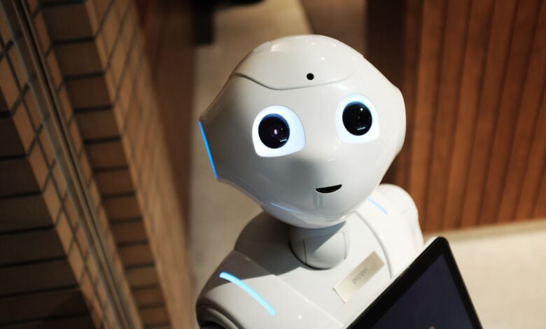 A futuristic humanoid robot in an indoor Tokyo setting, showcasing modern technology.