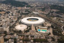Aerial shot of the iconic Maracanã Stadium in bustling Rio de Janeiro, Brazil.