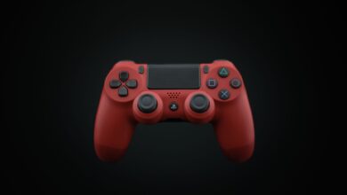 Vibrant red DualShock PS4 controller displayed on a dark background, highlighting modern gaming design.