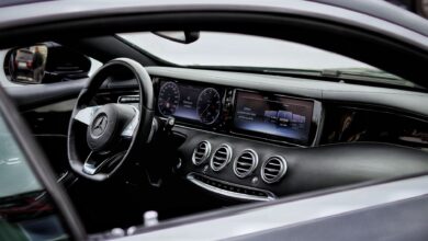 Explore the elegant interior of a Mercedes-Benz with intricate details and a sleek design.