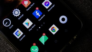 Close-up of a smartphone screen displaying various social media and app icons.