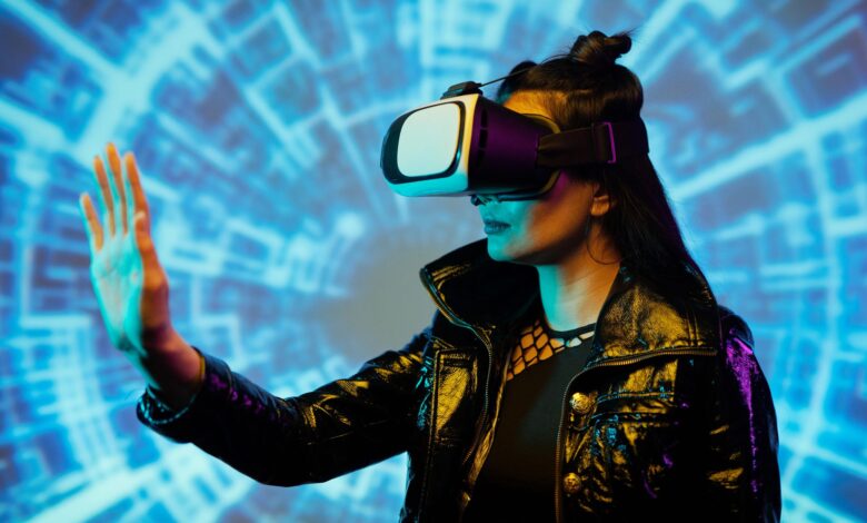 Woman wearing VR headset interacting with virtual interface in futuristic setting.