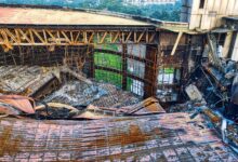 A dramatic view of a collapsed building roof showcasing architectural decay in Banten, Indonesia.