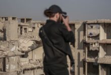A photographer captures the crumbling ruins of war-torn Damascus, Syria.