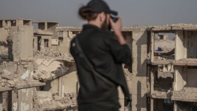 A photographer captures the crumbling ruins of war-torn Damascus, Syria.