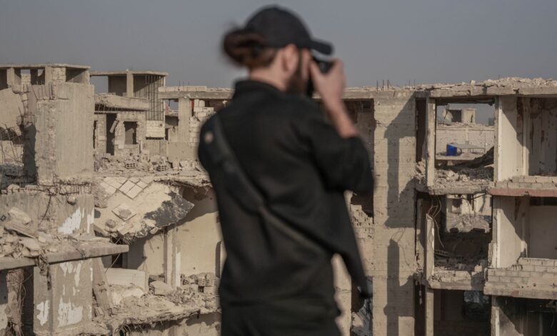 A photographer captures the crumbling ruins of war-torn Damascus, Syria.
