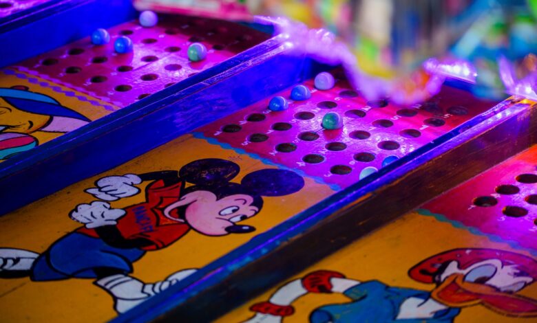 Vibrant arcade game featuring iconic cartoon characters under colorful lighting.