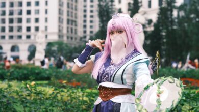 A captivating cosplay character posing in a vibrant urban garden setting in Vietnam.