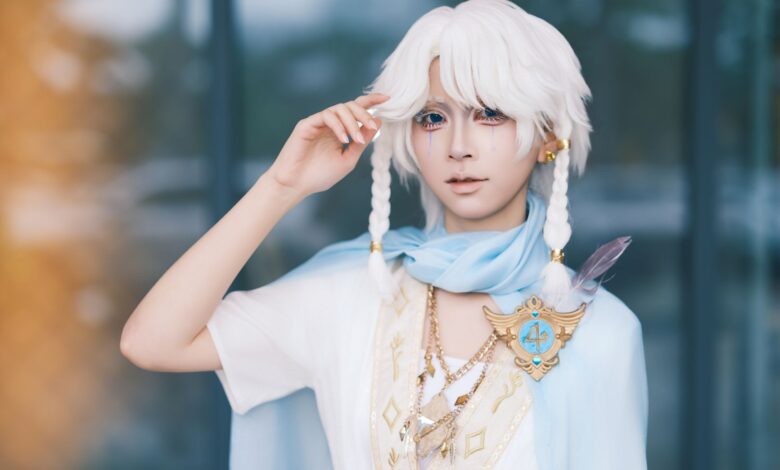 Stunning portrait of an adult in fantasy-themed cosplay with white hair and decorative jewelry.