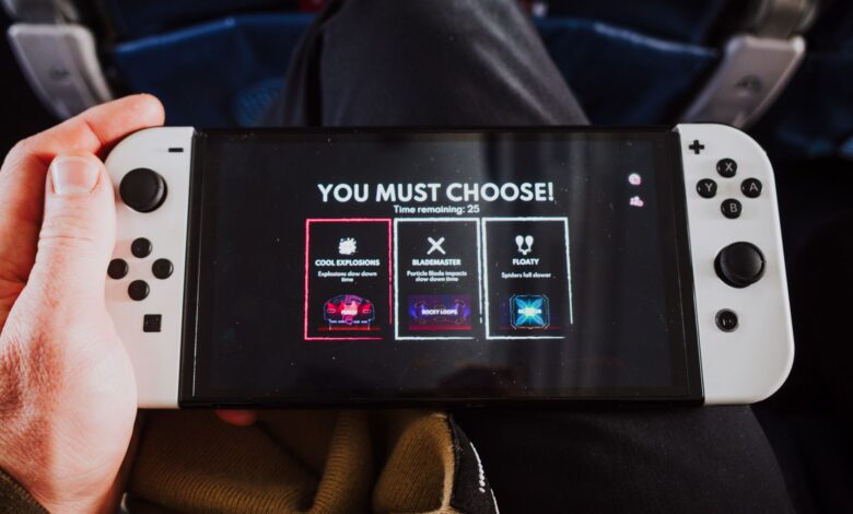 Close-up of a person holding a gaming console with an on-screen decision prompt.
