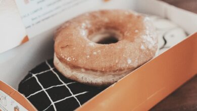 Delicious glazed donut in a box, perfect for sweet indulgence. Photographed in Bandung.
