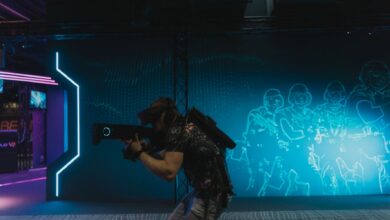 A man fully engaged in an immersive virtual reality gaming experience indoors.