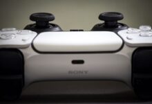 Detailed view of a Sony PlayStation 5 DualSense controller, highlighting design and features.