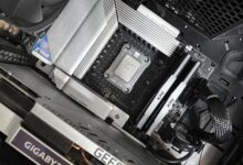 Interior view of a high-performance PC build featuring a Gigabyte motherboard and components.