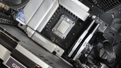 Interior view of a high-performance PC build featuring a Gigabyte motherboard and components.