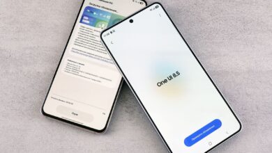 Two smartphones are shown displaying a software update screen with One UI 8.5.