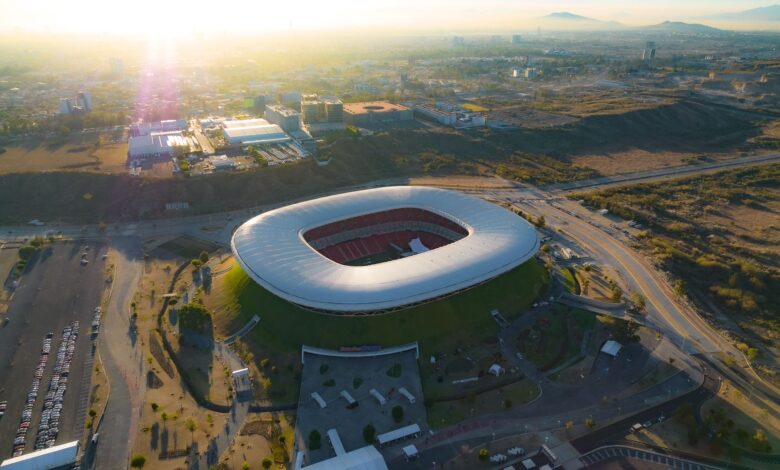 Captivating aerial shot of Estadio Akron in Zapopan, Mexico during sunset.