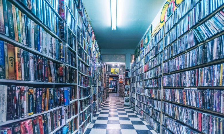 Explore a nostalgic video store aisle filled with classic VHS tapes, capturing retro vibes.