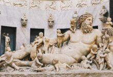 Detailed view of an ancient Roman marble sculpture depicting a mythological scene, rich in detail and artistry.