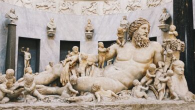 Detailed view of an ancient Roman marble sculpture depicting a mythological scene, rich in detail and artistry.
