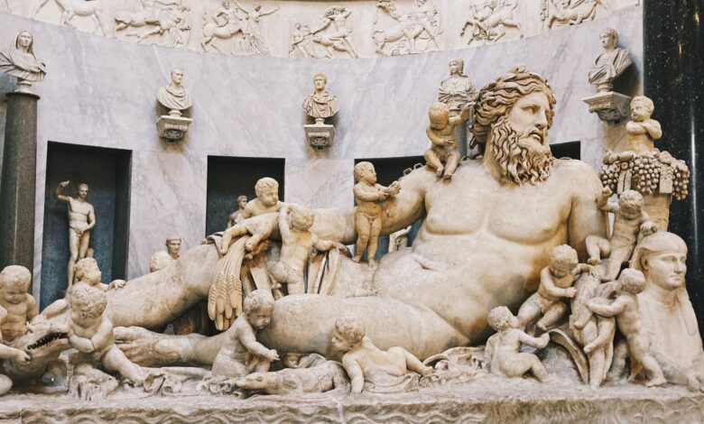Detailed view of an ancient Roman marble sculpture depicting a mythological scene, rich in detail and artistry.