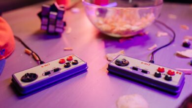Retro gaming scene featuring classic 8-bit controllers and a relaxed setting with snacks.