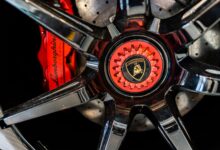 High-detail close-up of a Lamborghini wheel rim showing luxury and precision engineering.