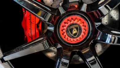 High-detail close-up of a Lamborghini wheel rim showing luxury and precision engineering.