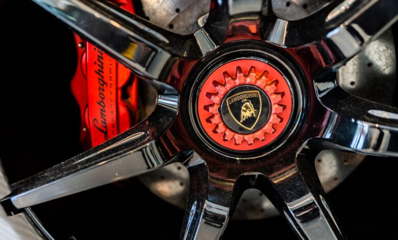 High-detail close-up of a Lamborghini wheel rim showing luxury and precision engineering.