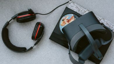 A flat lay of a VR headset and gaming accessories on a table.