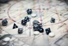 A collection of multi-sided dice on a detailed map, ideal for gaming enthusiasts