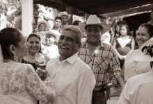 Lively wedding celebration with happy guests in traditional attire in Mexico.