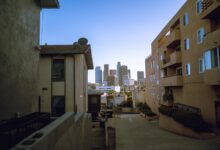 View of downtown skyscrapers from residential area, perfect for urban lifestyle themes.