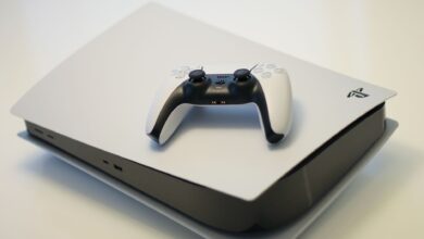 A sleek gaming console with a compatible controller, ideal for tech enthusiasts.