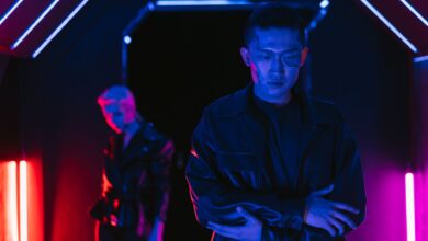 A cyberpunk-inspired scene with neon lights and characters in a futuristic setting.