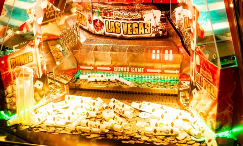 Colorful casino game machine featuring Las Vegas theme with coins and poker cards.