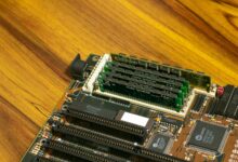 Detailed image of a vintage computer motherboard with RAM sticks.
