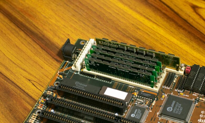 Detailed image of a vintage computer motherboard with RAM sticks.
