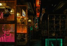 Dark, moody Tokyo diner with neon signs and anime decor, capturing cyberpunk culture.